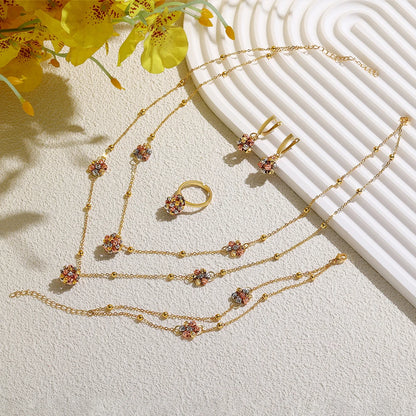 Elegant 4-Piece Hand-Woven Open Cuff Bracelet and Ring Set with Gold and Multi-Color Copper Beads for Women's Everyday Wear